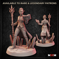 Digital render showing front and back views of an unpainted drow sorceress miniature — she holds a spiked staff in one hand and an open dragon-scale spellbook in the other, wearing a tailored coat with scaled hem details, standing on a crystal scatter base