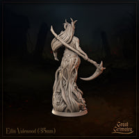 Eilin Valewood 35mm resin miniature — rear view showing the full sweep of the thorned vine gown, long flowing hair, and the diagonal shaft of the skull-tipped scythe across her back, with seed-pod and root detail on the base, unpainted grey resin render by Great Grimoire