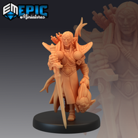 Unpainted resin miniature of an elf paladin at 32mm scale, shown on a black round base. The figure strides forward holding a longsword in his right hand and a severed goblin head in his left. He wears sculpted elven plate armour with winged pauldrons, carries a quiver of arrows on his back, and has antler-like growths rising from behind his head. A third eye marking sits at the centre of his brow. Printed in orange-toned resin, unpainted.