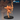 Unpainted 32mm resin miniature of a female elven ranger in a dynamic mid-stride pose, drawing a rune-carved longbow with an arrow nocked, wearing layered leather armour with wrapped bracers and greaves, quiver on her back, mounted on a plain round black base — sculpted by Epic Miniatures