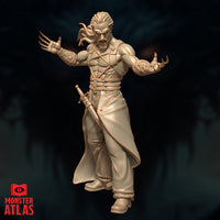 Three-quarter side view of the Eli Tomorast unpainted resin miniature showing the sweep of his coat panels, the lattice-etched filigree of his arcane gauntlets, long curved demonic claws, and his snarling expression in sharp sculpted detail. Monster Atlas logo visible.
