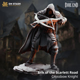 Hooded armoured figure leaning forward with a heavy crossbow raised, wearing studded and plate armour with a sweeping cloak. Detailed cracked stonework base on a black display plinth. Sculpt by DM Stash.