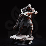 Crossbow knight in a low crouch behind a large riveted wooden pavise shield, crossbow levelled, chainmail hood drawn low over a masked face. Stone rubble base. Sculpt by DM Stash.