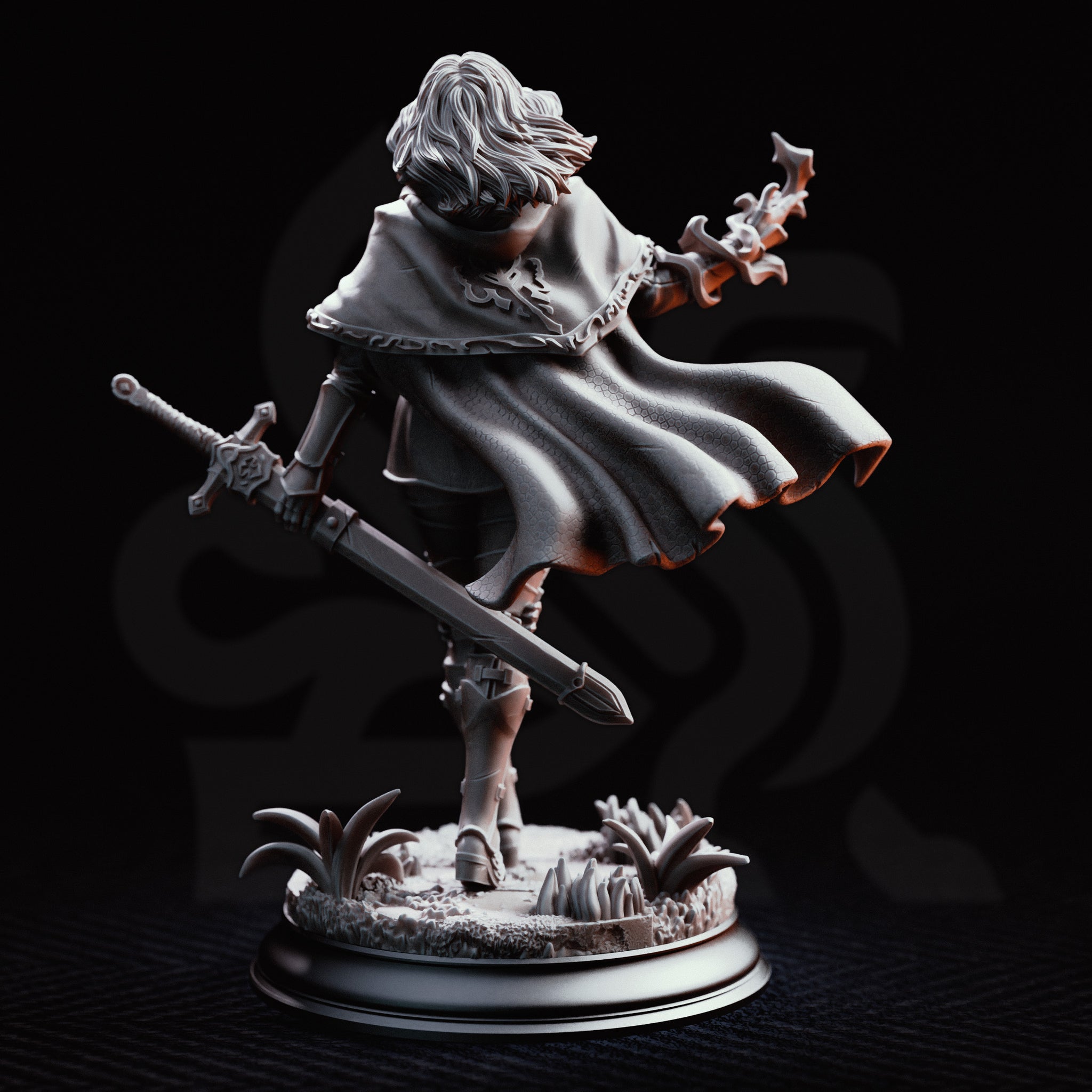 Erina of Amarth striding forward with a longsword lowered at her side and her right hand raised, channelling arcane energy. She wears a layered longcoat, travelling armour, and a circular medallion. Sculpt by DM Stash.