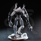Rear three-quarter view photograph of the unpainted grey resin Evarak Treant of Duskweave miniature, highlighting the gnarled root-like legs, vine wrappings, splintered bark detail across the back and arms, and the barbed weapon tip visible swinging at the end of the outstretched arm.