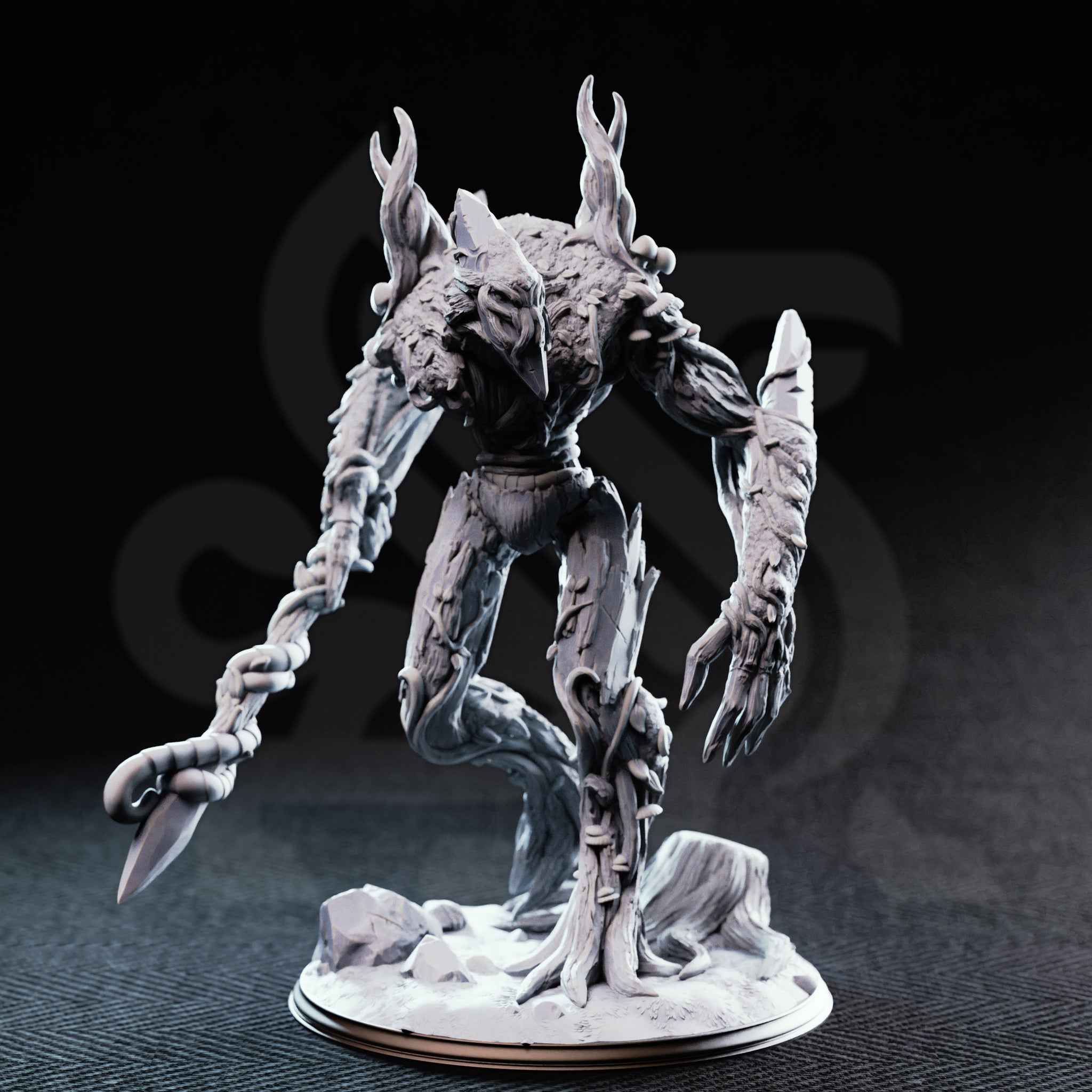 Front view photograph of the unpainted grey resin Evarak Treant of Duskweave miniature, showing the hollow mask-like face, mushroom growths on the torso, deeply textured bark surface detail, and barbed branch-flail weapon. Mini is posed dynamically with one leg raised.