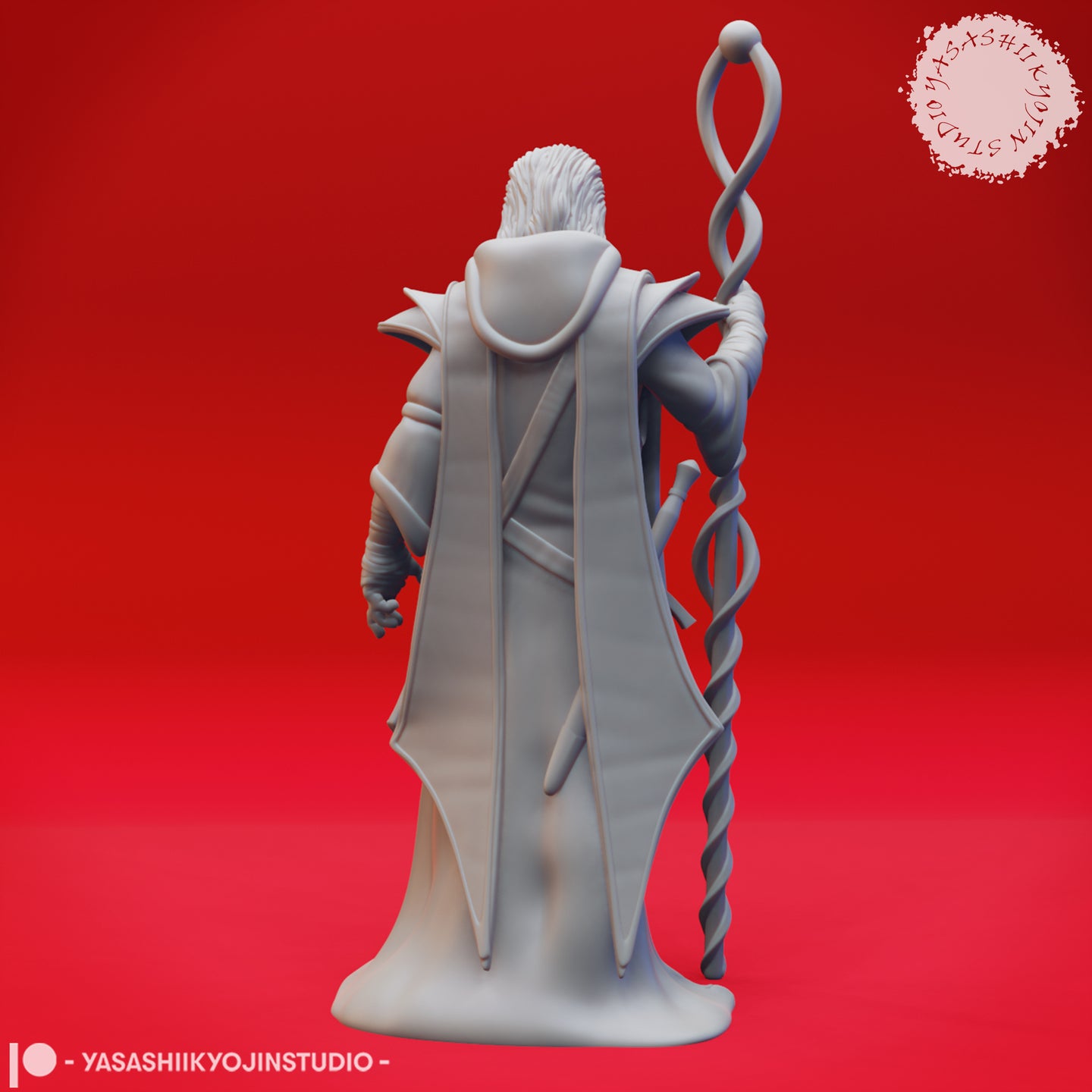 Rear view of the same unpainted grey resin evil mage miniature, showing the long angular split robes, a short sword scabbard at the back, and the twisted staff visible over the right shoulder