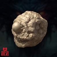Three-quarter side-angle digital render of the Eye Monger miniature revealing the full roundness of the sculpt and the uneven cratered texture across its flanks, with the single eye and toothed maw visible from the left side, unpainted