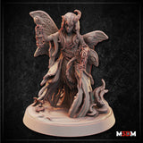 Digital render of the Fairy Warlock miniature by Mia Kay M3DM — a horned fairy figure with moth-like wings etched with eye markings, wearing tattered layered robes, raising an ornate lantern in one hand and trailing a heavy chain in the other, with flame and root tendrils rising from the scenic base