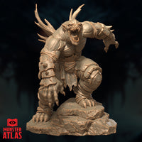 Farastu Demodand 32mm resin miniature by Monster Atlas — front-right view showing the creature lunging forward, jaw wide open with rows of serrated teeth, crown of gnarled antler horns, spiked gauntlet on the outstretched right arm, and crude armoured bracers bound with cord, mounted on a rocky rubble base. Unpainted sandy-beige render.