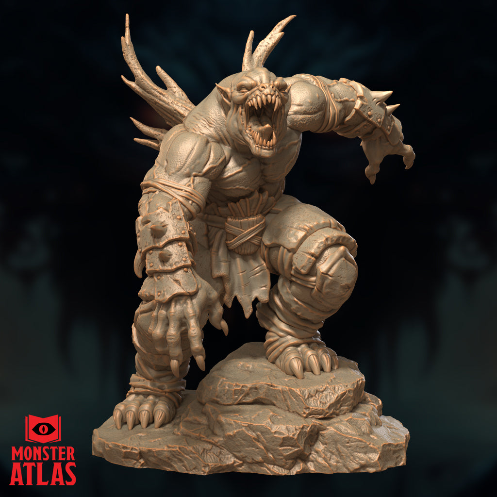 Farastu Demodand 32mm resin miniature by Monster Atlas — front-right view showing the creature lunging forward, jaw wide open with rows of serrated teeth, crown of gnarled antler horns, spiked gauntlet on the outstretched right arm, and crude armoured bracers bound with cord, mounted on a rocky rubble base. Unpainted sandy-beige render.