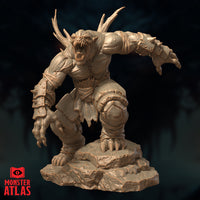 Farastu Demodand 32mm resin miniature by Monster Atlas — straight-on front view showing the full symmetry of the sculpt: wide stance on rocky base, both arms spread, mouth agape, horns fanning outward, and iron-riveted armour plates across forearms and knees. Unpainted sandy-beige render.