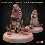 Digital render of a female halfling wizard miniature at 32mm scale, shown from front and rear. She stands on a scenic base with crystals and flowers, wearing a long travelling cloak and floral crown, clutching a large spellbook to her chest with a confident expression.