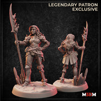 Digital render showing two views of the Female Steampunk Fighter miniature — front view with hand on hip holding a tall flame-tipped spear, wearing layered mechanical plate armour with articulated pauldrons and long flowing hair, and a rear view showing hair and back armour detail, both on textured rocky bases. Labelled as a Legendary Patron Exclusive by M3DM.