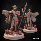 Digital render of the Fey Monarch Warrior miniature showing front and back views — a tall male fey warrior with large moth-patterned wings, braided hair, and layered shoulder armour, holding a tall iron-tipped spear. The detailed base features crystal formations, scattered stones, and small roses.