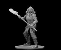 Unpainted grey resin 3D printed miniature of a female frost giant warrior, posed in a combat-ready stance holding a broad-bladed pole axe diagonally across her body. She wears a winged helmet, layered leather armour, fur-wrapped greaves, and cross-laced boots. Her eyes are sculpted with a glowing expression. The mini is mounted on a round base. 32mm scale by MZ4250.