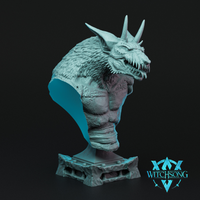 Digital render of an unpainted gargoyle display bust by Witchsong Miniatures, shown in teal-grey resin colour. The bust features a snarling gargoyle head with multiple sharp horns, narrowed eyes, open jaws with jagged teeth, and a heavily textured neck covered in overlapping scales and feathered ridges. The piece is mounted on a stone plinth with rivet detailing and rubble edging. Witchsong Miniatures logo visible in the lower right corner.