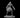 Grey resin digital render of a Ghast miniature at 32mm scale — a gaunt, muscular undead humanoid in a wide predatory crouch with elongated claws, pointed ears, forked tongue, and ragged cloth wrappings at the waist, wrists, and ankles, mounted on a flat round base
