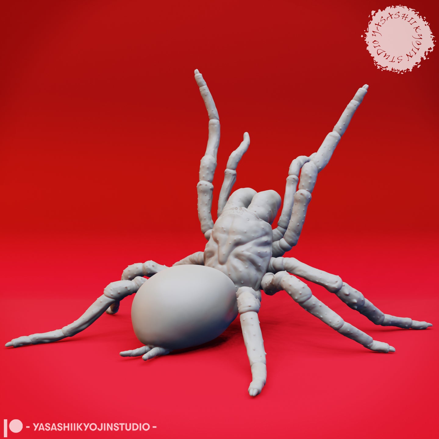 Grey unpainted resin giant spider miniature shown from a three-quarter rear angle — large smooth abdomen prominent, segmented legs fanned outward, detailed cephalothorax texture visible. Sculpted by Yasashii Kyojin Studio.