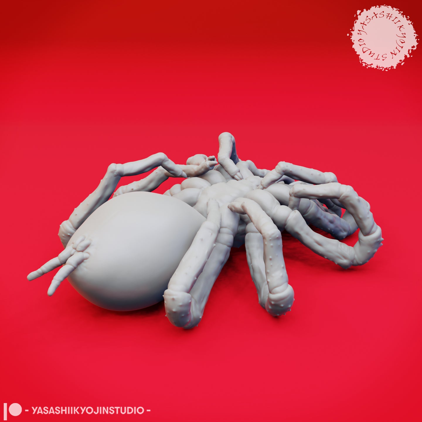 Side view of an unpainted grey resin giant spider miniature showing the raised bulbous abdomen, jointed legs with textured surface detail, and low crouching pose