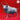 Three-quarter front view of an unpainted grey resin Gorgon miniature by Yasashii Kyojin Studio, showing the armoured plated torso, sweeping curved horns, dorsal spine ridge, and cloven hooves with tapered points — digital render on red background