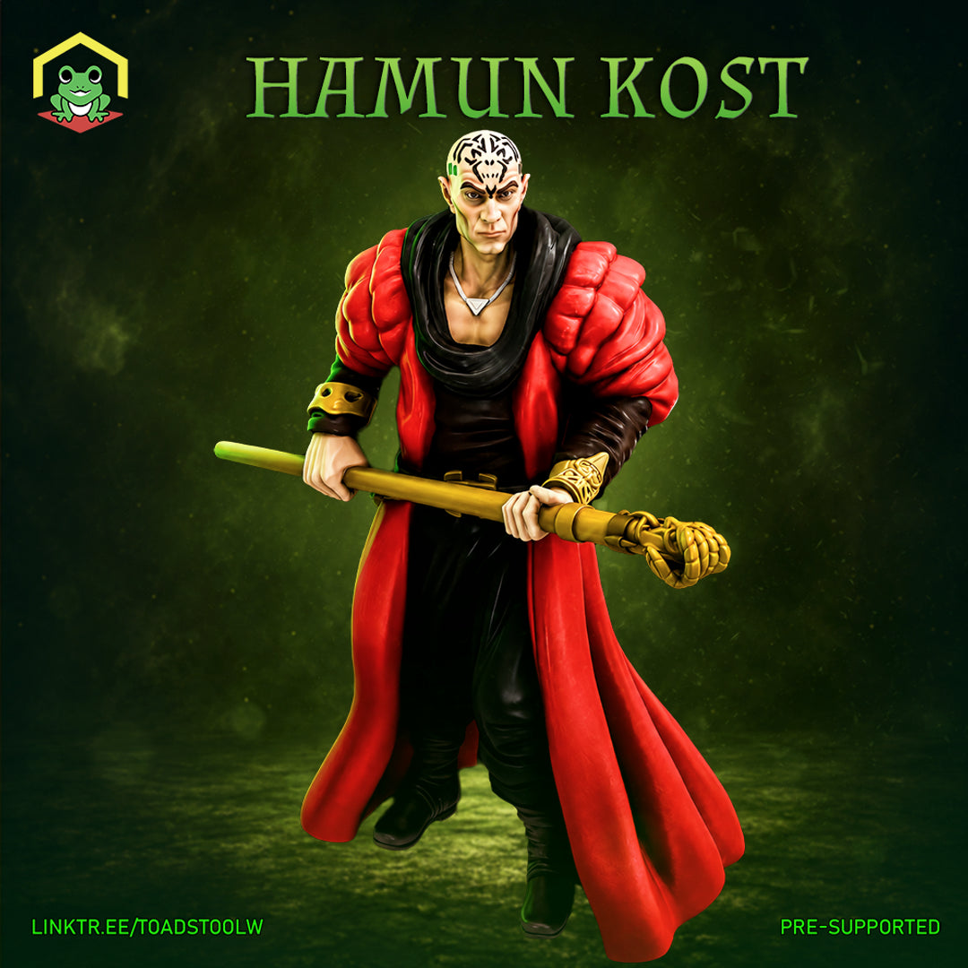 Bald male mage gripping a long golden staff in both hands, wearing a bulky crimson and black robe with heavy padded shoulders. Tribal tattoos cover his scalp. Expression is cold and calculating. Sculpt by The Toadstool Weaver.
