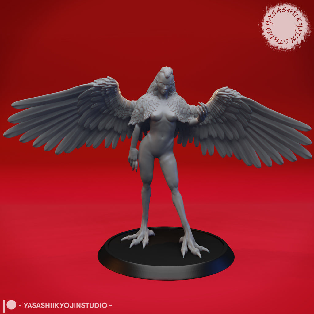 Unpainted grey resin render of a harpy miniature by Yasashii Kyojin Studio — winged humanoid female with large spread feathered wings, avian taloned feet, and a feathered crest, mounted on a round black base