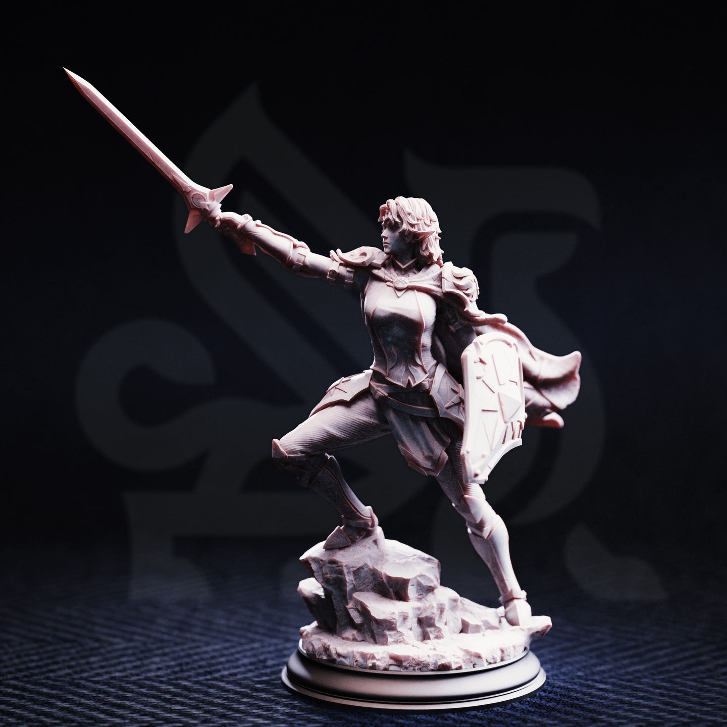Unpainted grey resin miniature of Hitalia, Paladin of Glanion, photographed from the front against a dark background — showing her determined expression, articulated plate armour with detailed pauldrons, outstretched sword arm, and flowing tabard, mounted on a scenic rocky base with a display plinth