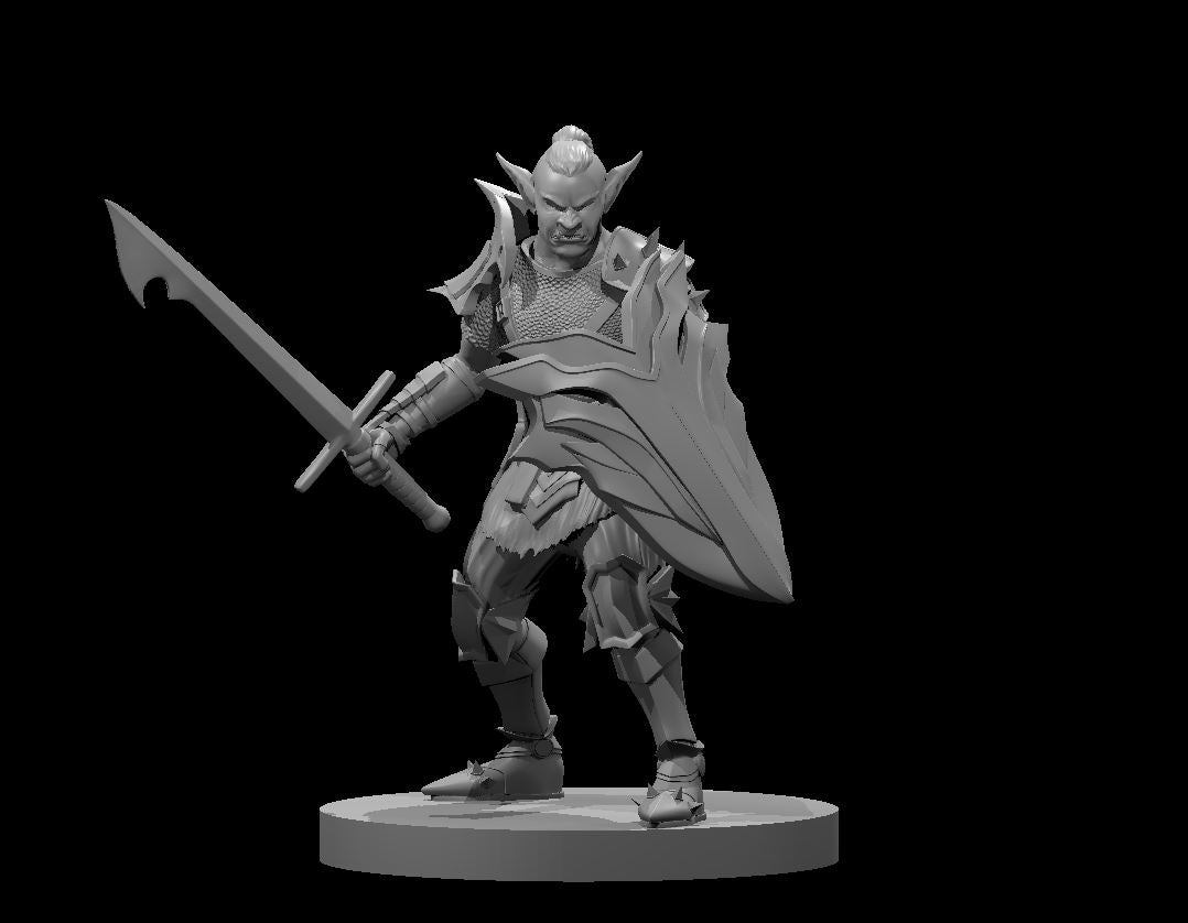 Grey resin render of a hobgoblin warrior miniature at 32mm scale, posed in a low combat stance with a broad kite shield raised and a heavy sword drawn back. The figure wears angular spiked pauldrons over chainmail, articulated leg armour, and has a top-knot hairstyle and pointed ears. Mounted on a round flat base.