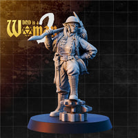 Hobgoblin engineer standing with long blade resting across her shoulder, wearing a buckled military coat, mesh-visor helmet, laced boots, and an expedition pack with coiled rope. Sculpt by DnD Is A Woman.