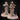 Two angles of the Holy Sister Sharpshooter resin miniature — unpainted grey resin showing a robed woman in a flowing veil with hands clasped in prayer, a long rifle slung across her back, bandolier and buckled kit at her waist, on a base decorated with melted candle stubs