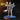 Female human cleric standing upright, raising an ornate flame-wreathed flail overhead in her right hand, long braids falling over armoured shoulders, coat billowing behind. Sculpt by DnD Is A Woman.