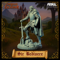 Sir Bedivere unpainted grey resin miniature, three-quarter view, leaning forward with one foot raised on rocky rubble, both hands gripping a great sword planted before him, wearing plate armour with fur mantle and flowing cape — Chronicles of Excalibur by Primal Collectibles