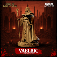 Vaelric Evil Sorcerer miniature from a slightly lower angle, dark hooded cloak billowing to one side revealing a teal inner lining, ornate robe panel and skull belt clearly visible, staff raised, tome open in his other hand. Sculpt by Primal Collectibles.
