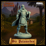 Three-quarter front view digital render of Sir Palamedes unpainted grey resin miniature — standing in a resolute pose with sword lowered and round shield braced, scale armour and flowing cloak visible, on a rocky scenic base. Chronicles of Excalibur by Primal Collectibles.