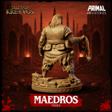 Maedros the Thief rear three-quarter view — heavy build with layered fabric across the back, rope and hook hanging at his side, detailed rubble and debris on the scenic base. Sculpt by Primal Collectibles.