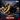 Digital render of the Kreyvos Northman barbarian display bust by Primal Collectibles — front three-quarter view showing a bare-chested, long-haired barbarian mid-charge, mouth open in a battle roar, wielding a chain-wrapped greataxe, wearing a billowing feathered cloak, set against a snowy mountain backdrop