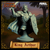 Digital render of the King Arthur bust miniature from Chronicles of Excalibur — unpainted grey resin render showing the warrior-king in three-quarter front view, sword raised in his right hand, lion heraldic shield in his left, wearing plate armour with chainmail sleeves, a jewelled crown, and a billowing cloak, mouth open in a battle cry