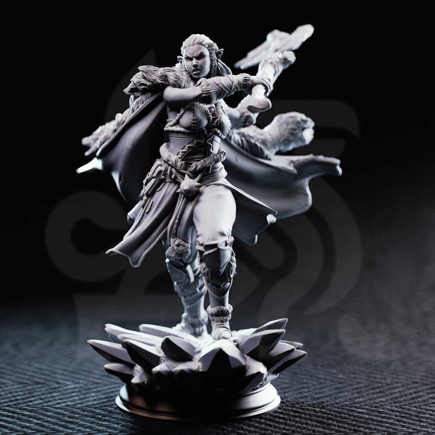 Unpainted grey resin miniature of Ice Heart by DM Stash — front view showing dynamic mid-stride pose, fur pauldrons, layered leather armour, and frost magic effect on outstretched weapon arm, on a splintered ice crystal base