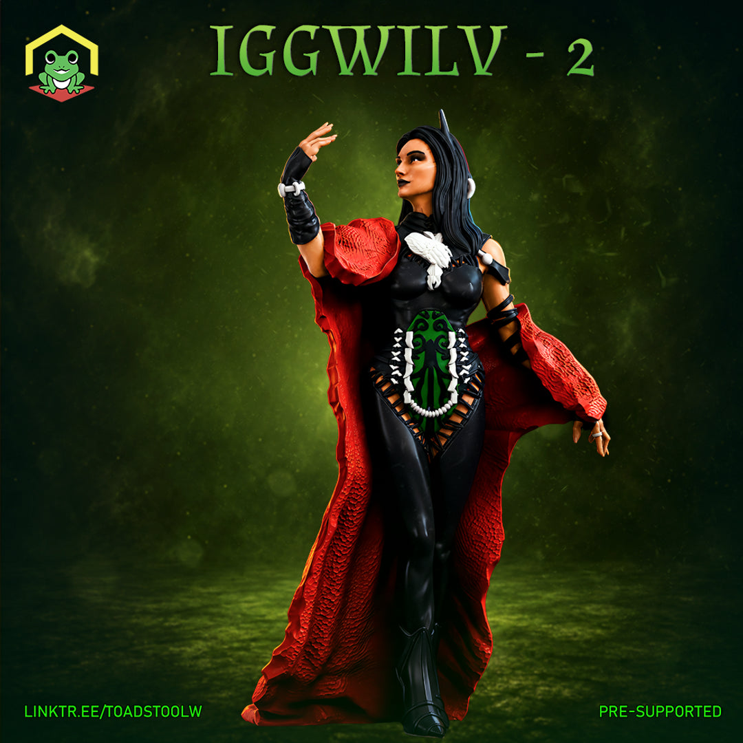Iggwilv miniature by The Toadstool Weaver — woman with long black hair, one arm raised, wearing a fitted dark bodysuit with green sigil, sweeping red cloak billowing behind her.