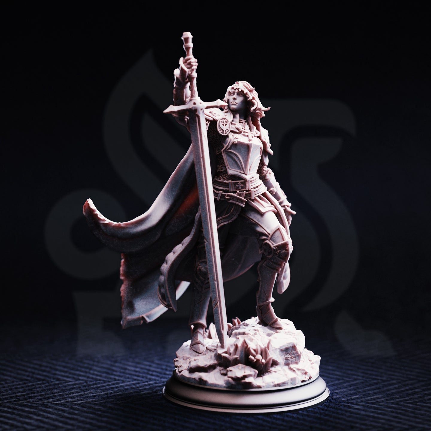 Front view of unpainted grey resin Jeanne du Lac miniature on a dark background — showing her full plate armour detail, raised greatsword, long flowing hair, and scenic rocky base with debris.