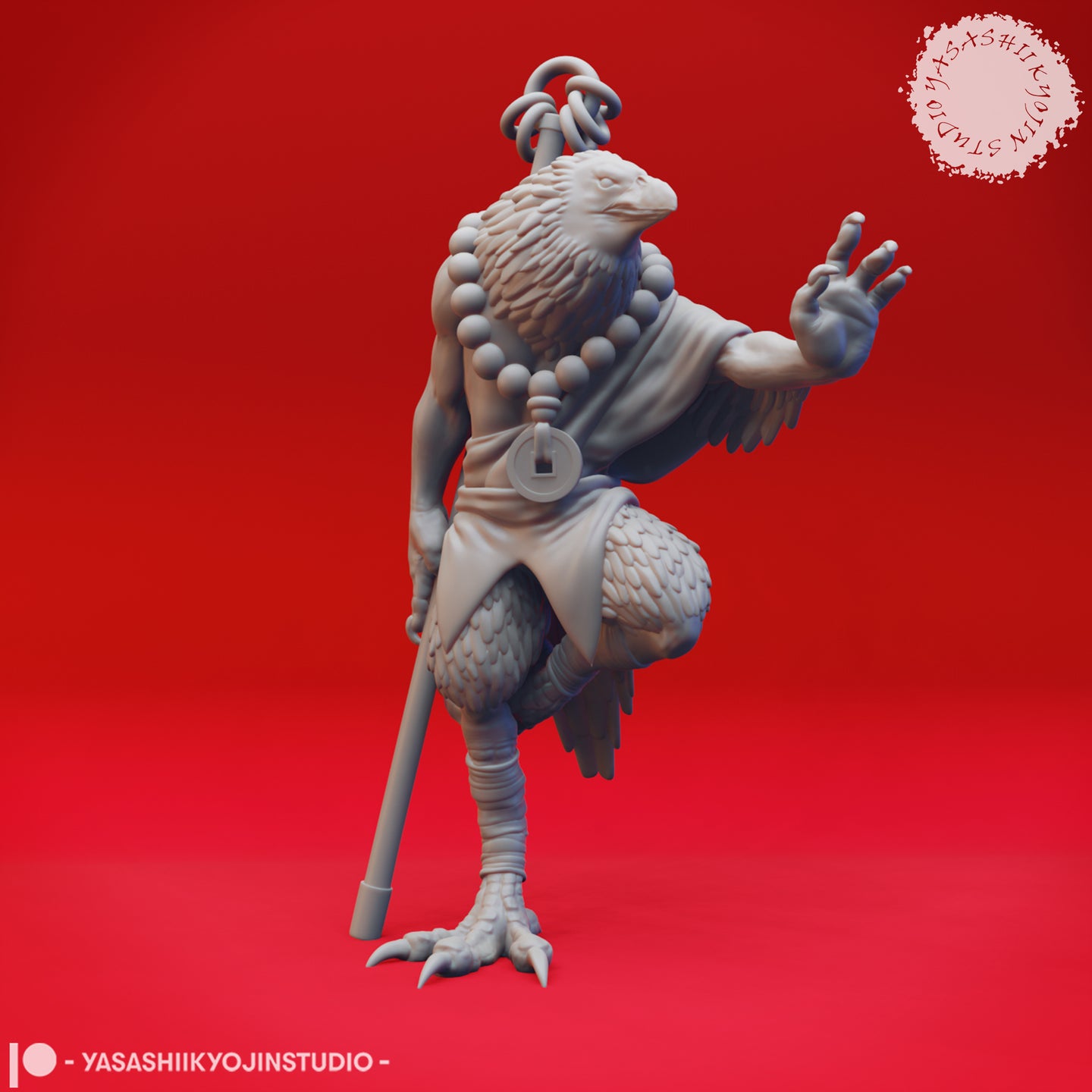 Grey resin digital render of a kenku birdfolk miniature with an eagle head, holding a tall ritual staff topped with a knotted coil, wearing prayer beads and a coin pendant, one taloned hand raised in a spiritual gesture — front three-quarter view