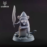 Front view of an unpainted grey resin shrew miniature at 32mm scale, wearing a conical wizard's hat and round spectacles, holding a large quill feather aloft in one hand and an unrolled scroll in the other, with an inkwell on a cracked flagstone base