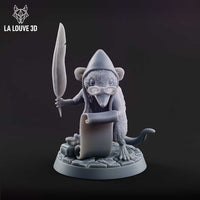 Front view of an unpainted grey resin shrew miniature at 32mm scale, wearing a conical wizard's hat and round spectacles, holding a large quill feather aloft in one hand and an unrolled scroll in the other, with an inkwell on a cracked flagstone base