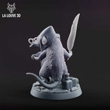 Rear three-quarter view of the unpainted grey resin shrew wizard miniature, showing detailed fur texture across the back, the conical hat, round spectacles, and the quill feather raised in the right hand, with the inkwell visible on the flagstone base