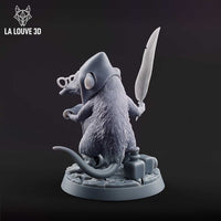 Rear three-quarter view of the unpainted grey resin shrew wizard miniature, showing detailed fur texture across the back, the conical hat, round spectacles, and the quill feather raised in the right hand, with the inkwell visible on the flagstone base