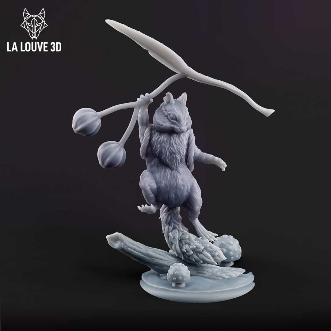 Front three-quarter view of an unpainted grey resin chipmunk miniature by La Louve 3D, standing on a woodland log base scattered with toadstools, raising a large leaf overhead while gripping a seed-pod flail — fey creature at 32mm scale