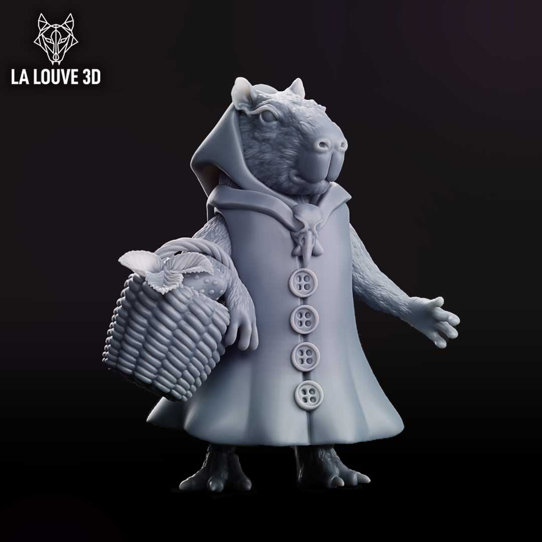 Capybara character in a buttoned hooded cloak, standing upright holding a wicker basket filled with mushrooms and leaves. Small horns visible beneath the hood, scaled taloned feet, textured fur arms. Sculpt by La Louve 3D.