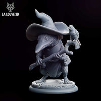 Hunched shrew miniature in a wide-brimmed witch's hat, gripping a forked staff with a raven perched on top, wearing a button-fastened robe. Sculpt by La Louve 3D.