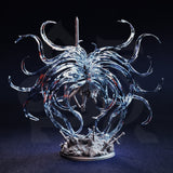 Photograph of unpainted grey resin Leopold the Ascended miniature — rear view showing the full extent of the spectral aura wrapping behind the figure, with red detailing visible in the tendrils and the detailed back plate of the crusader armour visible at the centre